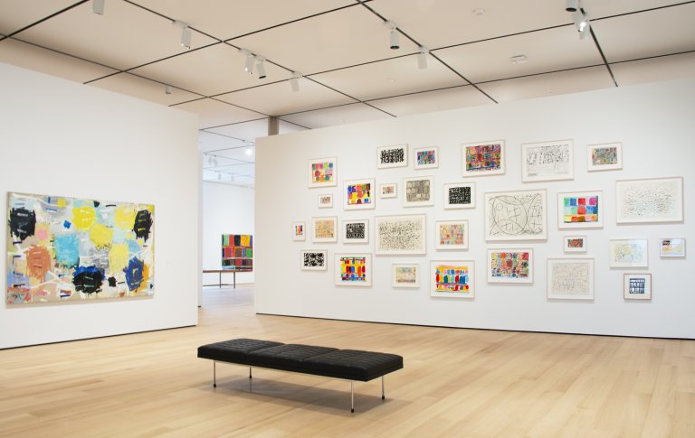 Abstract paintings by Stanley Whitney featuring a structured grid of colorful rectangular blocks, separated by thin lines, creating a rhythmic composition